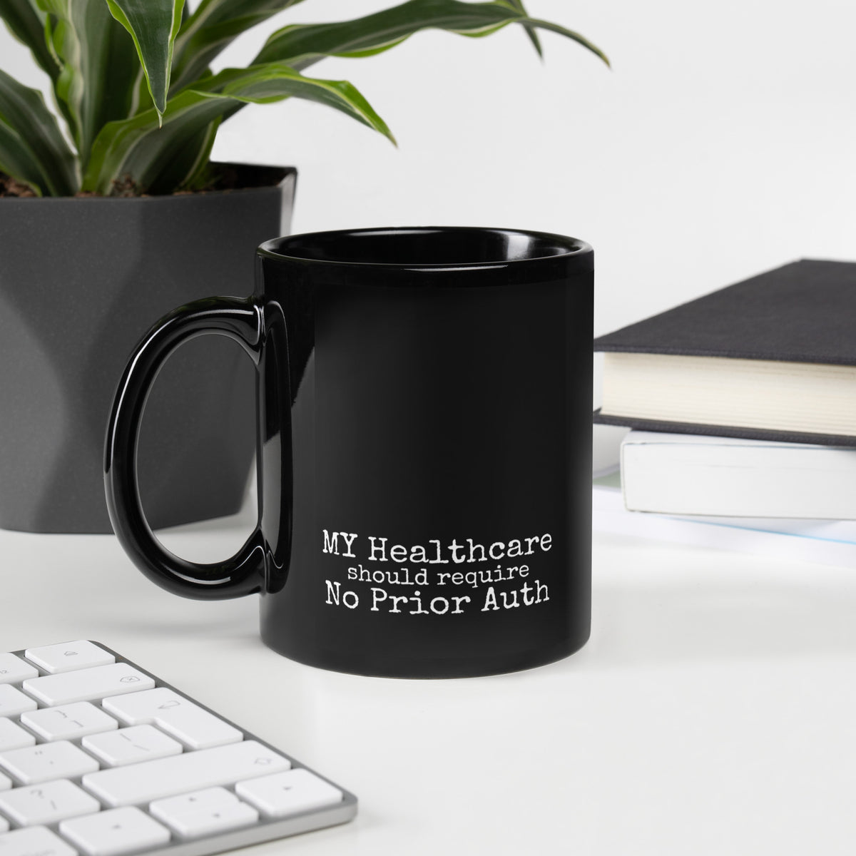 THE HARD STOP Mug, black glossy 11 oz ceramic coffee mug with white logo, handle on left, physician owned