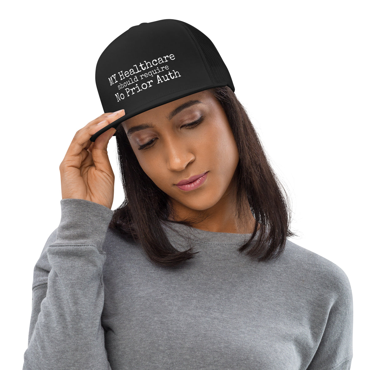 THE OVERHEAD PAGE Trucker Cap in black, physician trucker hat with white logo, front view, physician owned