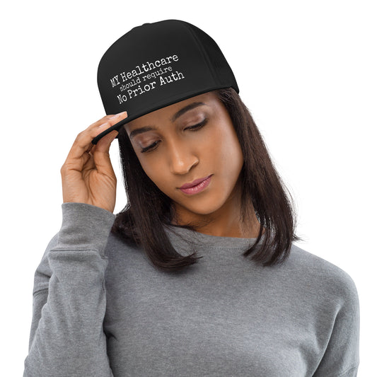THE OVERHEAD PAGE Trucker Cap in black, physician trucker hat with white logo, front view, physician owned