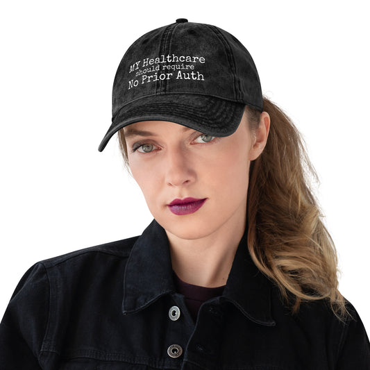THE CHARGE NURSE Vintage Cap in black, washed cotton dad hat with white embroidery, front view, physician owned